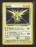base-set-zapdos-016-102-damaged-1