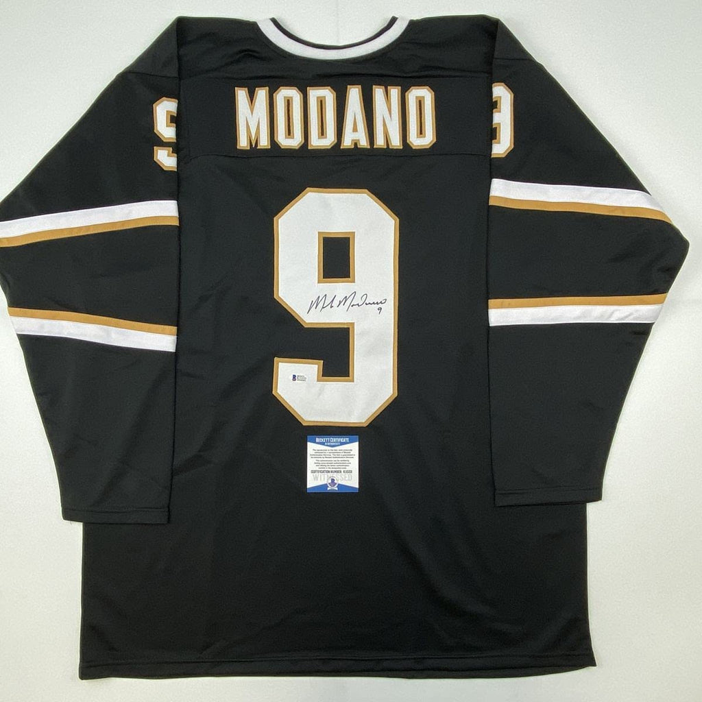 autographed-signed-mike-modano-dallas-black-hockey-jersey-beckett-bas-coa