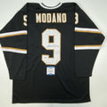 autographed-signed-mike-modano-dallas-black-hockey-jersey-beckett-bas-coa