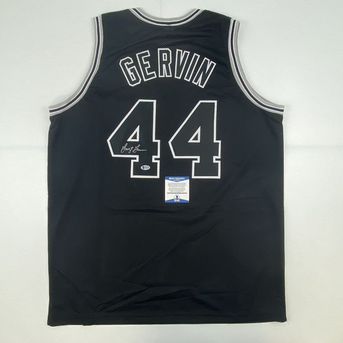 autographed-signed-george-gervin-san-antonio-black-basketball-jersey-beckett-bas-coa