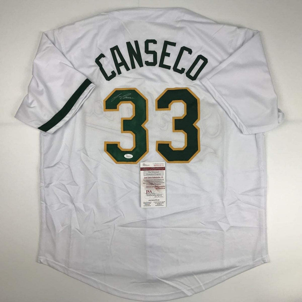 autographed-signed-jose-canseco-oakland-white-baseball-jersey-jsa-coa