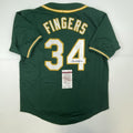 autographed-signed-rollie-fingers-oakland-green-baseball-jersey-jsa-coa