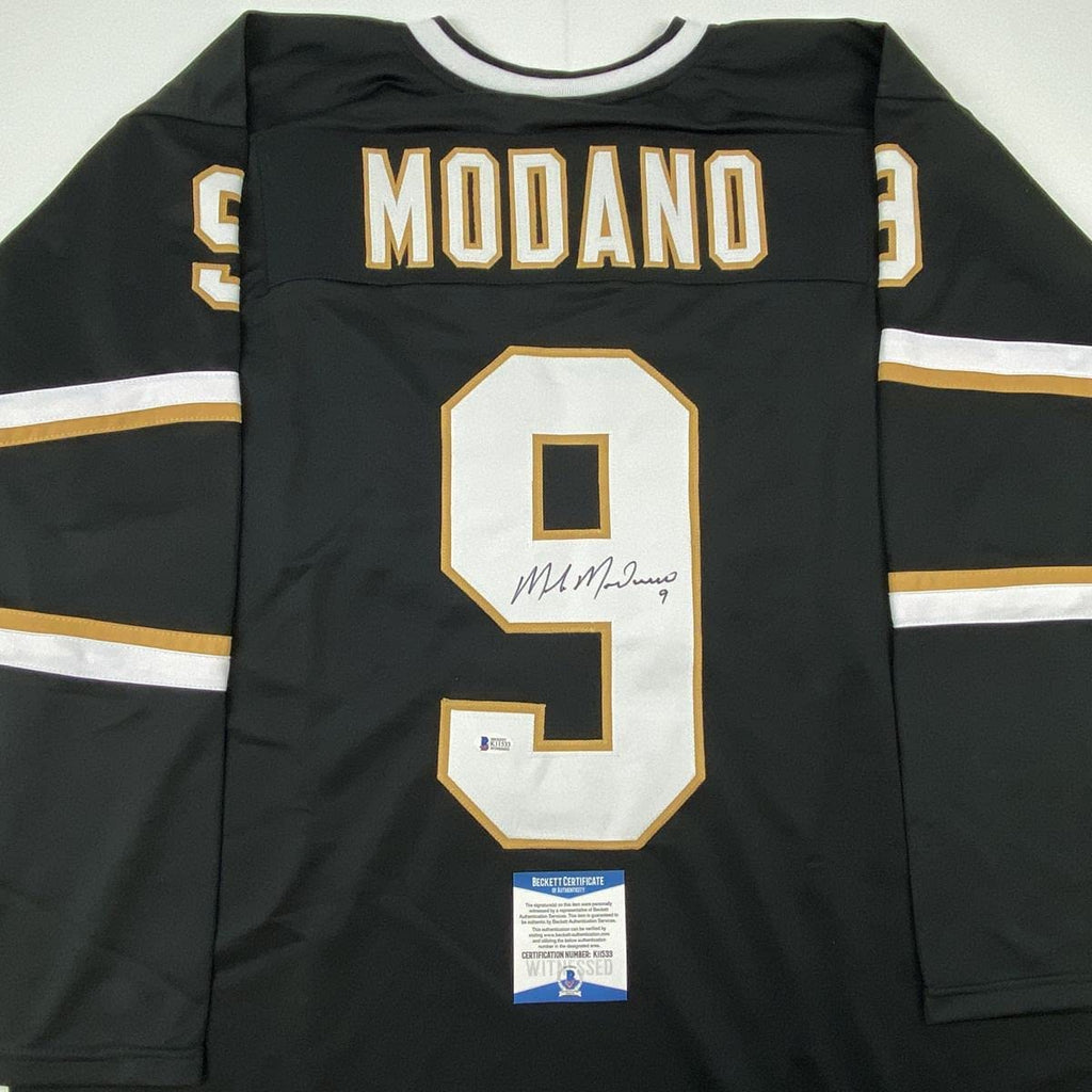 autographed-signed-mike-modano-dallas-black-hockey-jersey-beckett-bas-coa