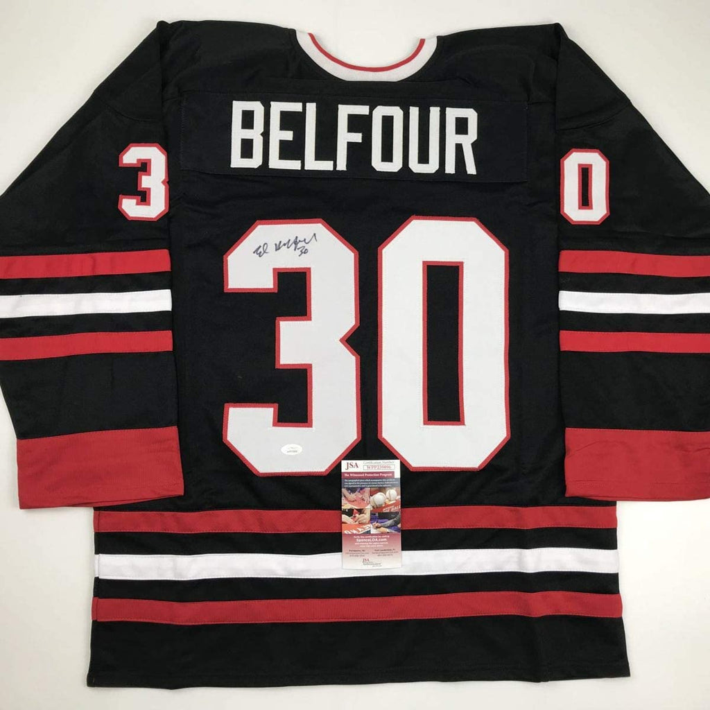 autographed-signed-ed-belfour-chicago-black-hockey-jersey-jsa-coa