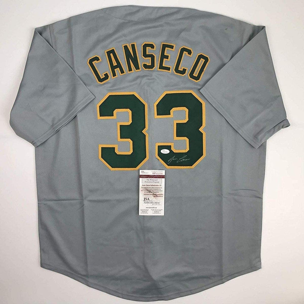 autographed-signed-jose-canseco-oakland-grey-baseball-jersey-jsa-coa