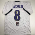 autographed-signed-lamar-jackson-baltimore-white-football-jersey-jsa-coa