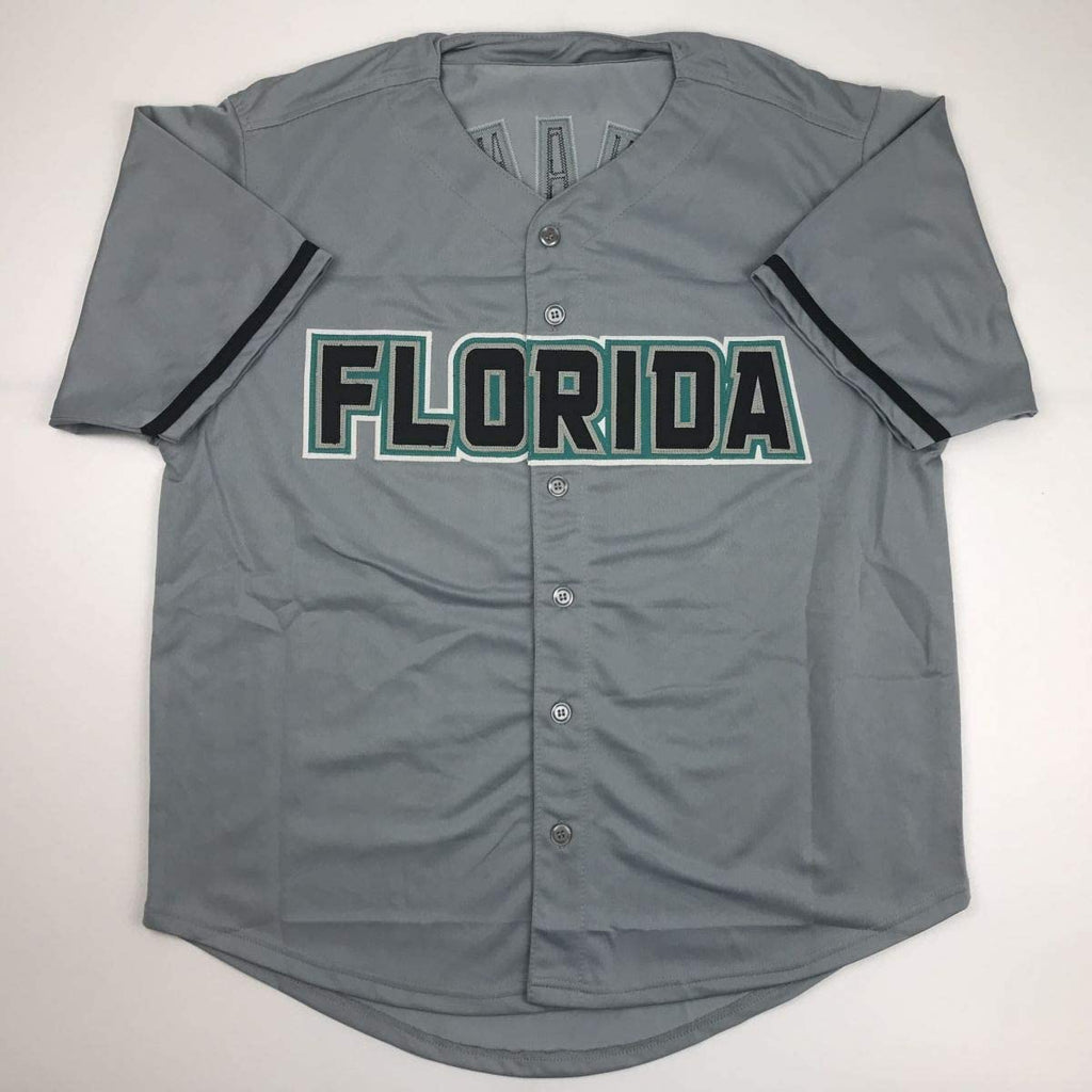 autographed-signed-livan-hernandez-97-ws-mvp-florida-grey-baseball-jersey-psa-dna-coa