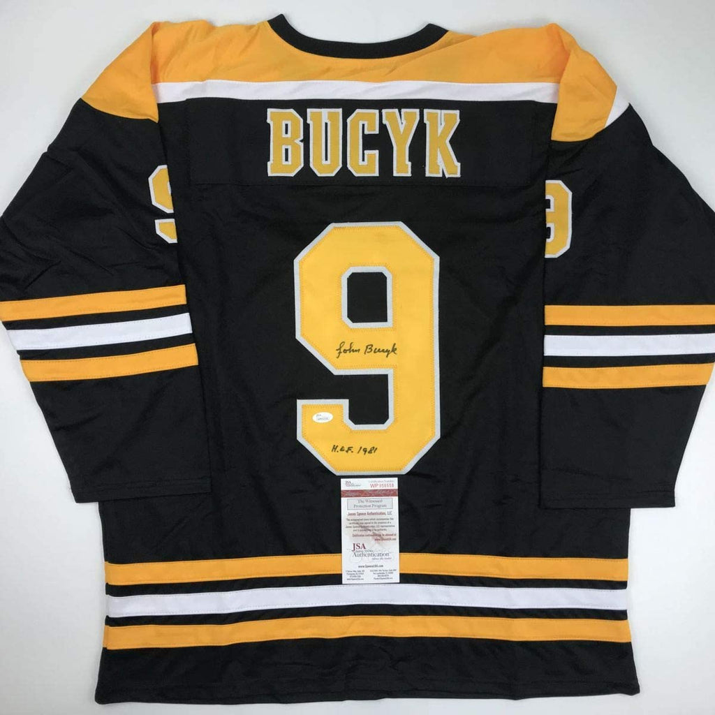 autographed-signed-johnny-john-bucyk-hof-1981-boston-black-hockey-jersey-jsa-coa