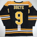 autographed-signed-johnny-john-bucyk-hof-1981-boston-black-hockey-jersey-jsa-coa