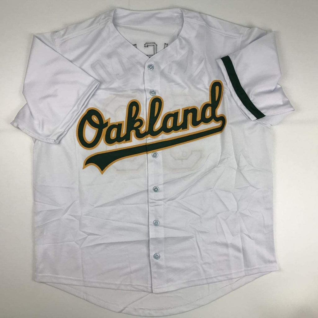 autographed-signed-jose-canseco-oakland-white-baseball-jersey-jsa-coa
