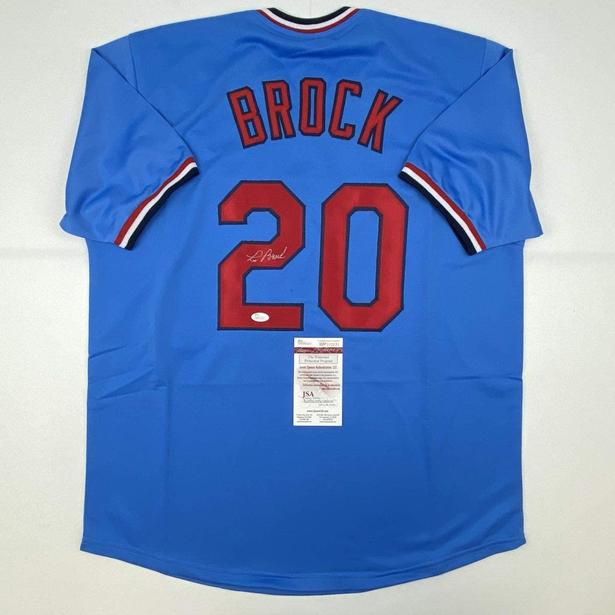 autographed-signed-lou-brock-st-louis-blue-baseball-jersey-jsa-coa