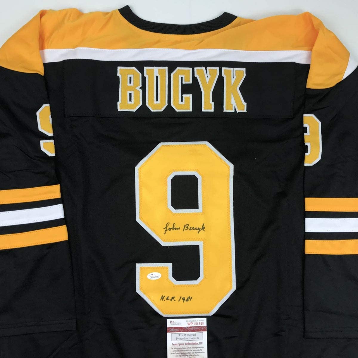autographed-signed-johnny-john-bucyk-hof-1981-boston-black-hockey-jersey-jsa-coa