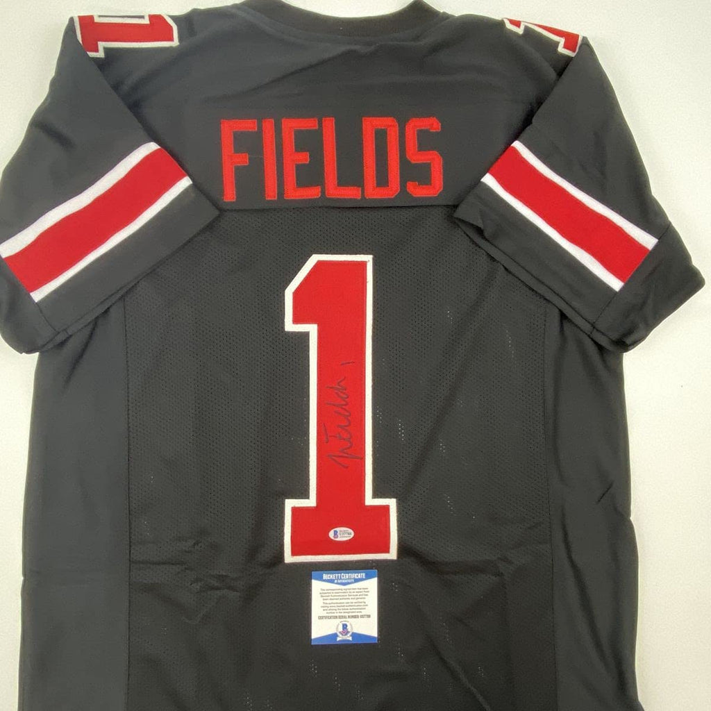 autographed-signed-justin-fields-ohio-state-black-college-football-jersey-beckett-bas-coa