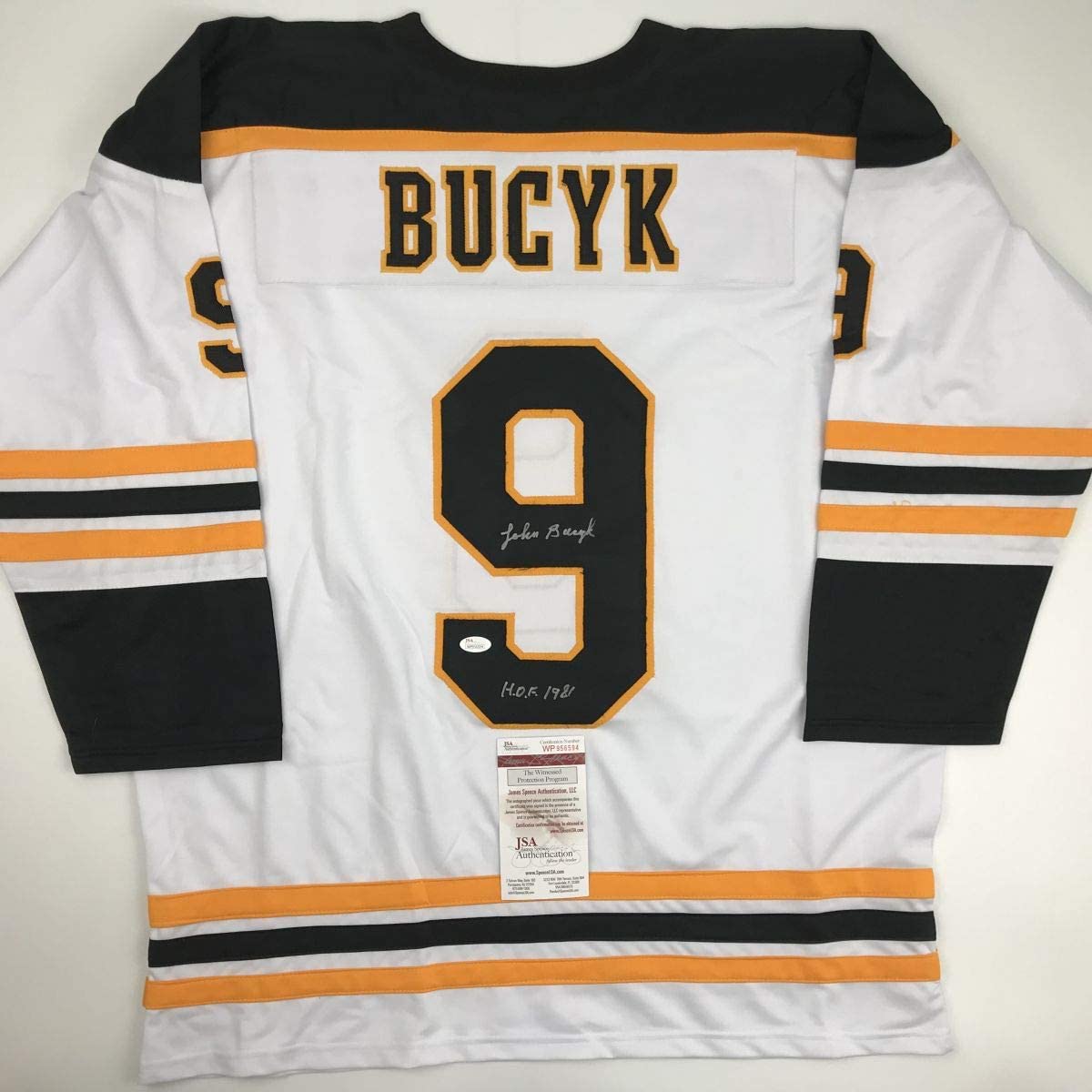 autographed-signed-johnny-john-bucyk-hof-1981-boston-white-hockey-jersey-jsa-coa