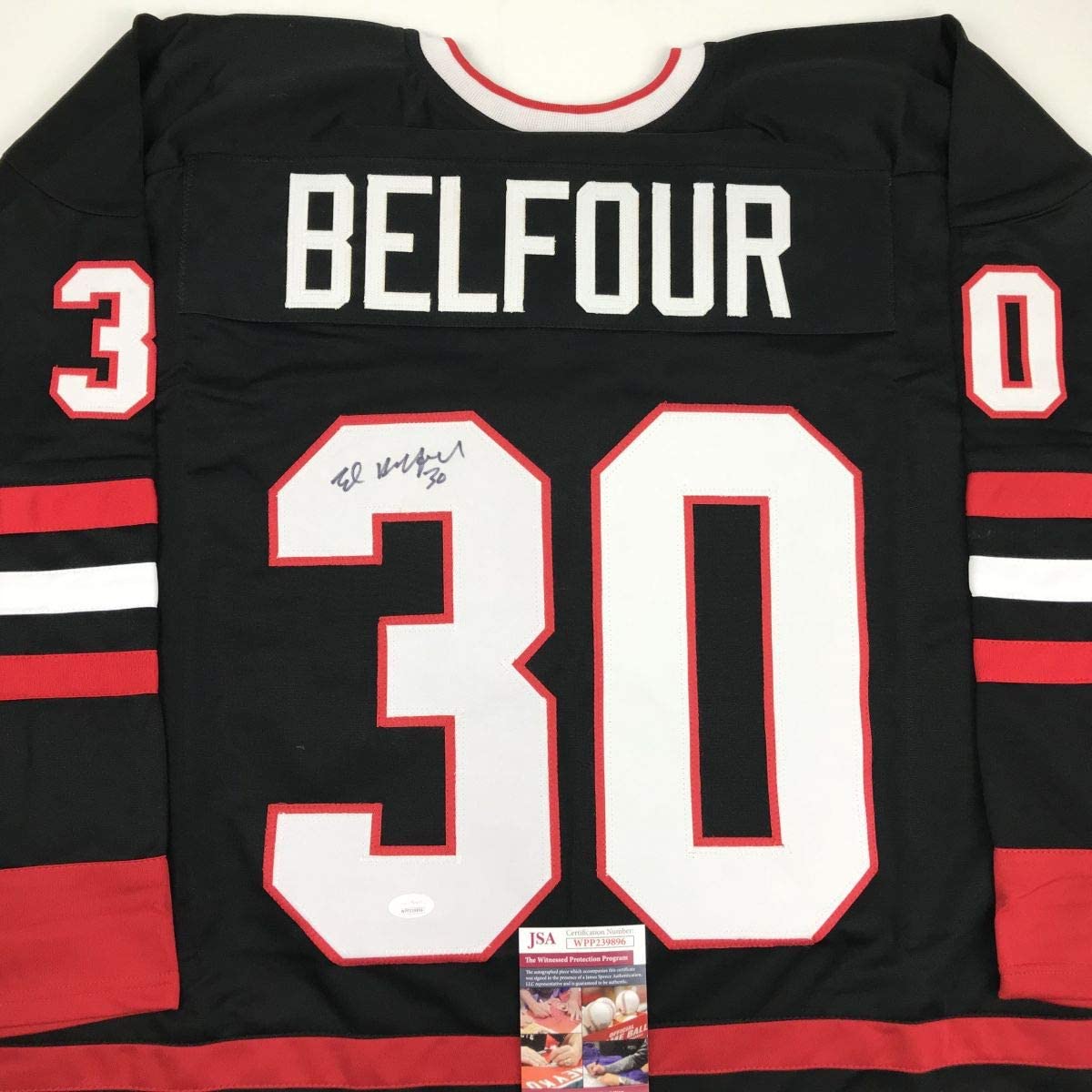autographed-signed-ed-belfour-chicago-black-hockey-jersey-jsa-coa