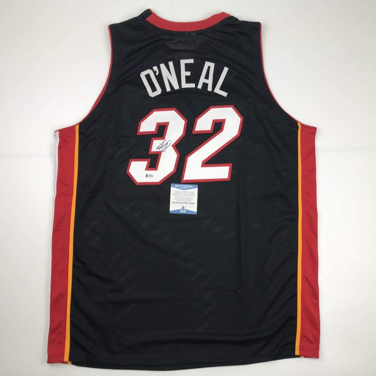 autographed-signed-shaquille-shaq-oneal-miami-black-basketball-jersey-beckett-bas-coa
