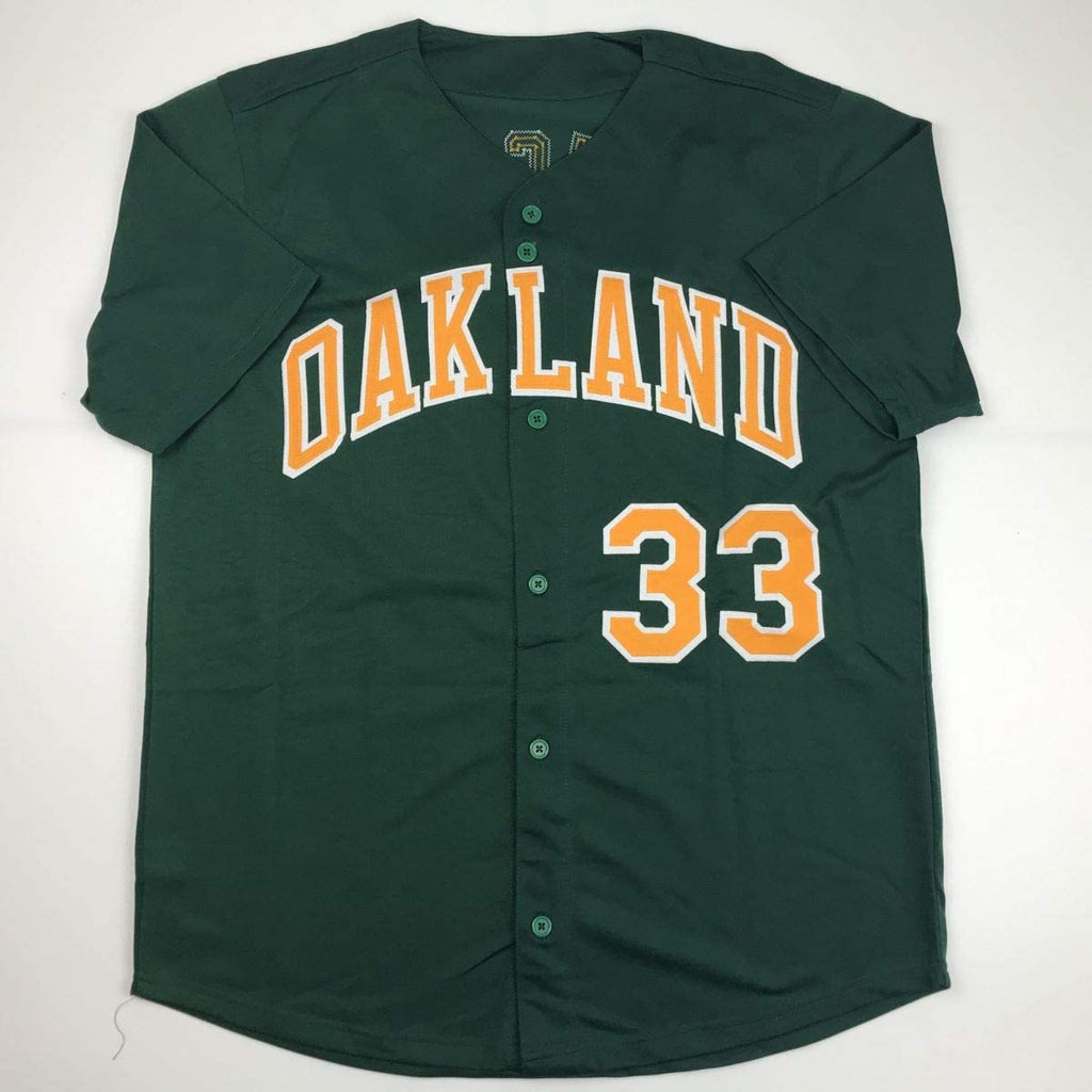 autographed-signed-jose-canseco-oakland-dark-green-baseball-jersey-jsa-coa
