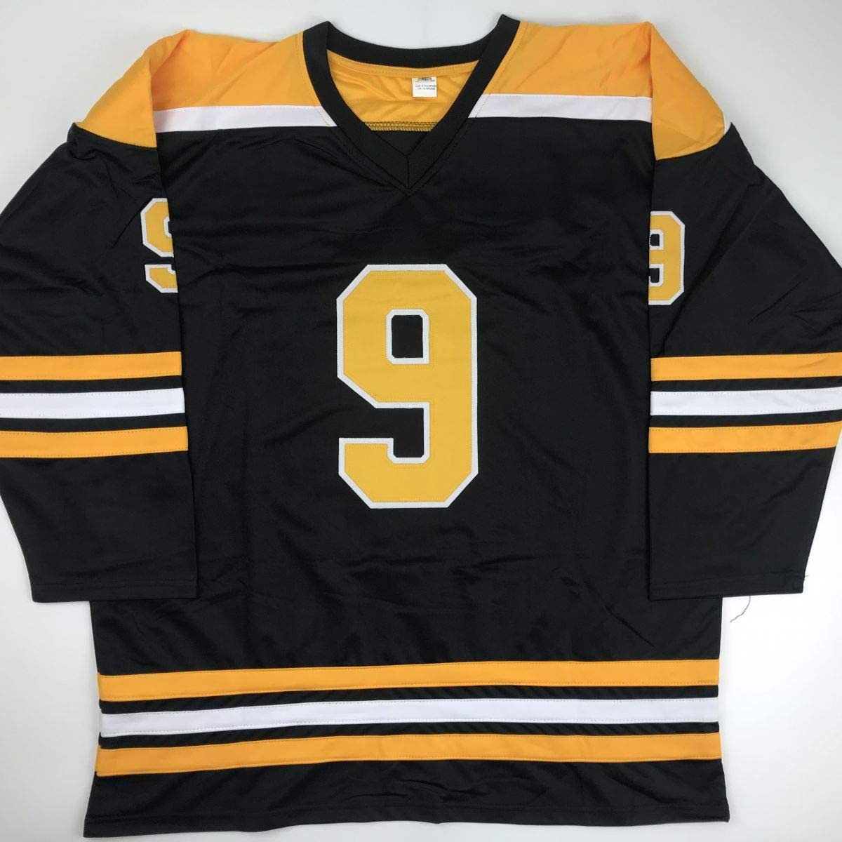 autographed-signed-johnny-john-bucyk-hof-1981-boston-black-hockey-jersey-jsa-coa