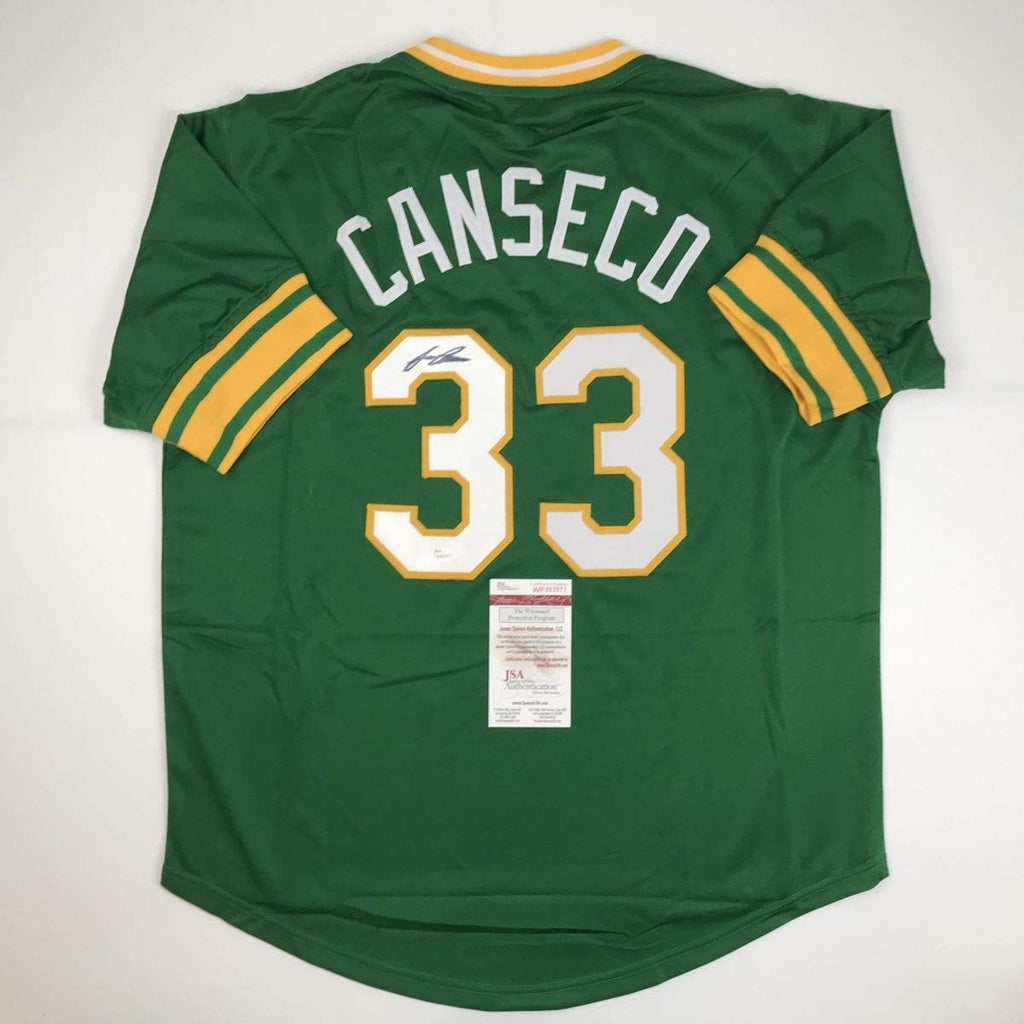 autographed-signed-jose-canseco-oakland-green-baseball-jersey-jsa-coa