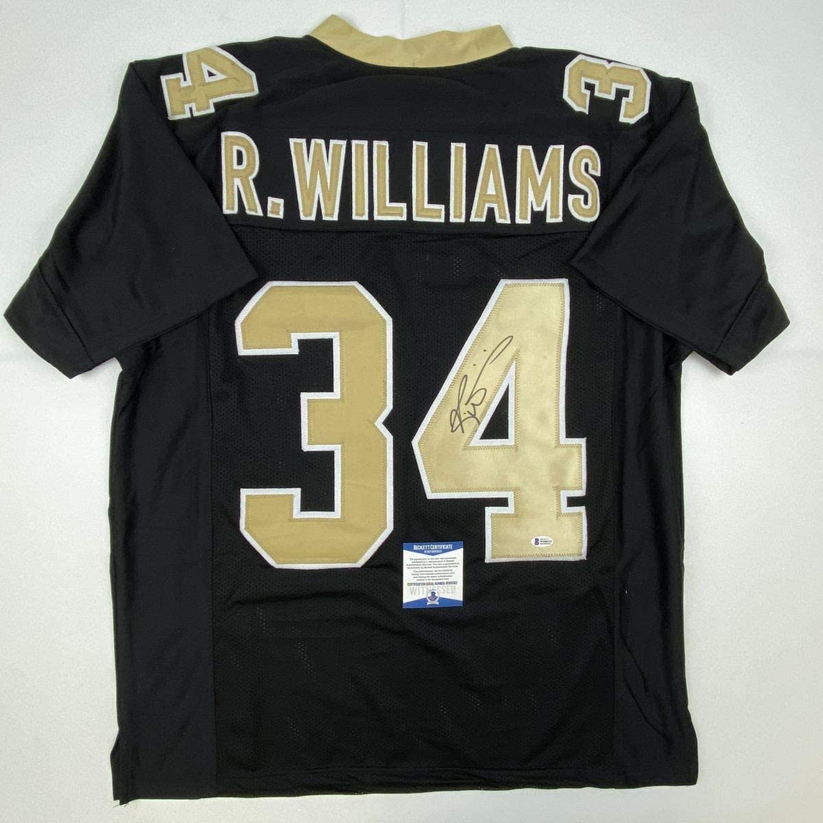 autographed-signed-ricky-williams-new-orleans-black-football-jersey-beckett-bas-coa