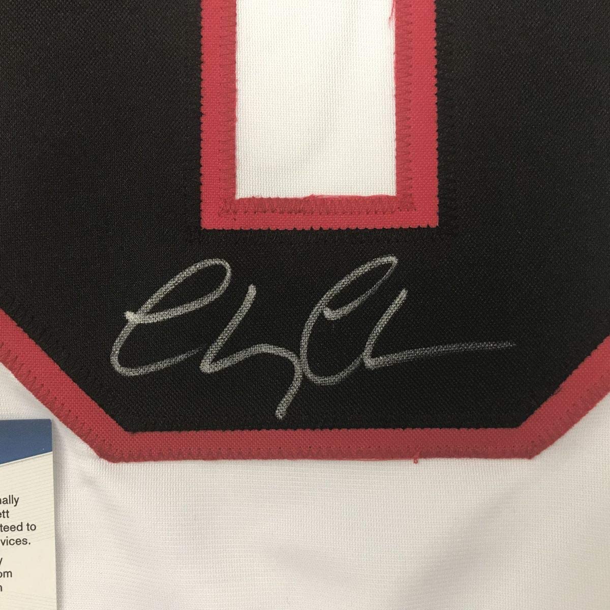 autographed-signed-chevy-chase-clark-griswold-christmas-vacation-movie-chicago-white-hockey-jersey-beckett-bas-coa