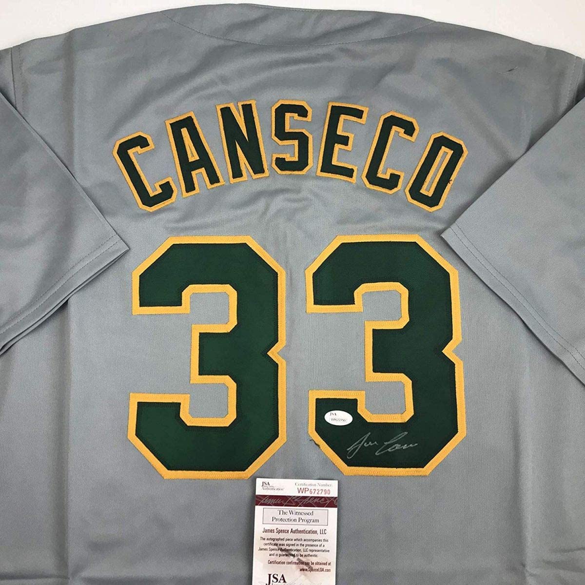 autographed-signed-jose-canseco-oakland-grey-baseball-jersey-jsa-coa
