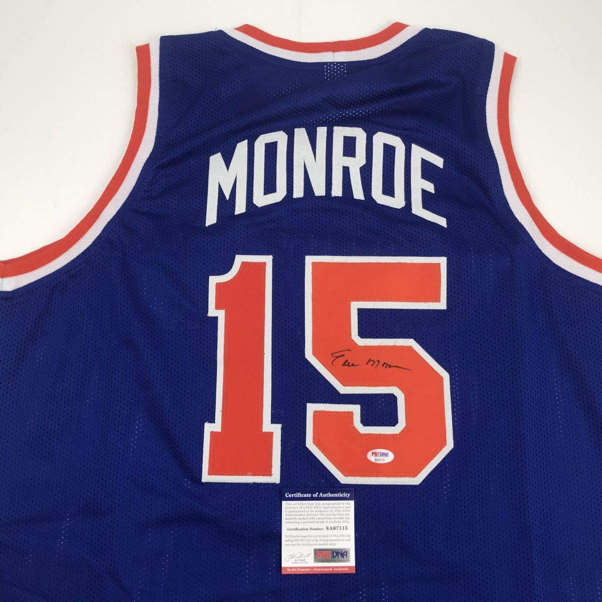 autographed-signed-earl-monroe-new-york-blue-basketball-jersey-psa-dna-coa