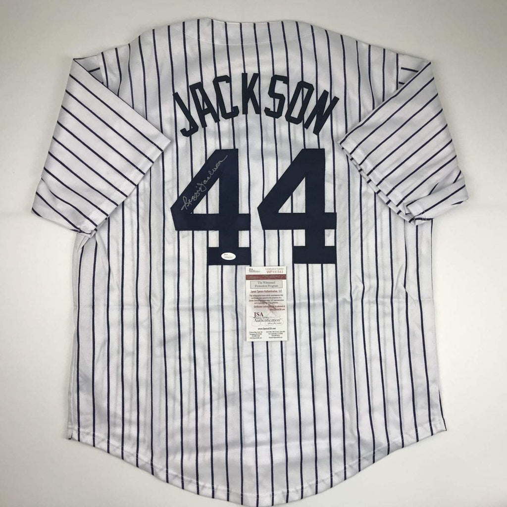 autographed-signed-reggie-jackson-new-york-ny-pinstripe-baseball-jersey-jsa-coa