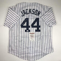 autographed-signed-reggie-jackson-new-york-ny-pinstripe-baseball-jersey-jsa-coa