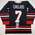 autographed-signed-chris-chelios-chicago-black-hockey-jersey-jsa-coa