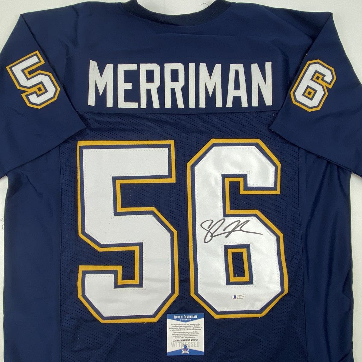 autographed-signed-shawne-merriman-san-diego-dark-blue-football-jersey-beckett-bas-coa