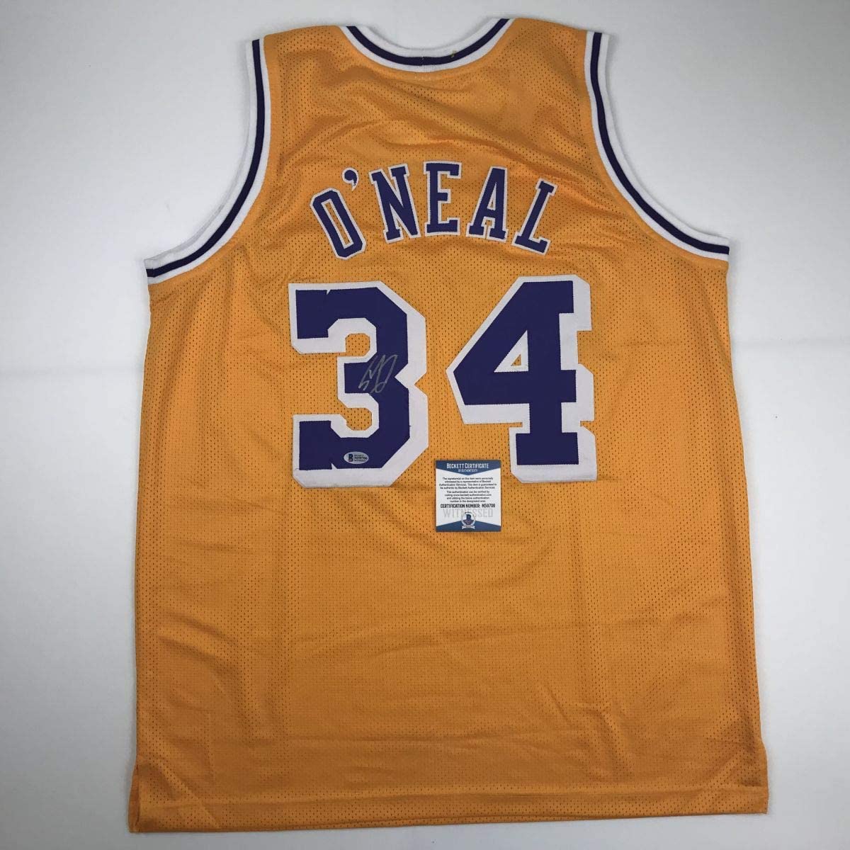 autographed-signed-shaquille-shaq-oneal-los-angeles-la-yellow-basketball-jersey-beckett-bas-coa-1