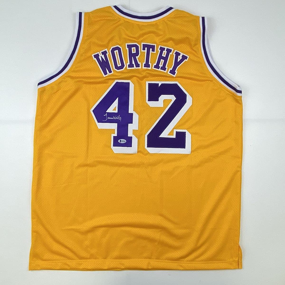 autographed-signed-james-worthy-los-angeles-la-yellow-basketball-jersey-beckett-bas-coa