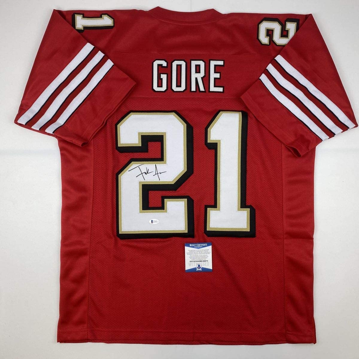 autographed-signed-frank-gore-san-francisco-red-alternate-football-jersey-beckett-bas-coa