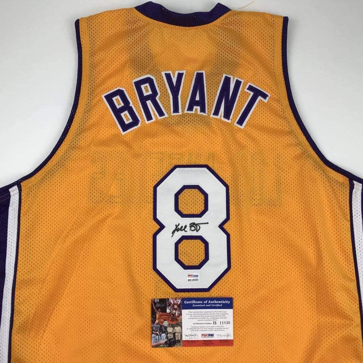 autographed-signed-kobe-bryant-8-los-angeles-yellow-basketball-jersey-psa-dna-coa
