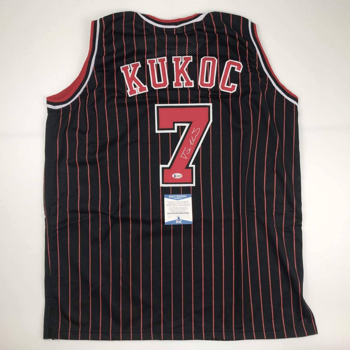 autographed-signed-toni-kukoc-chicago-black-pinstripe-basketball-jersey-beckett-bas-coa