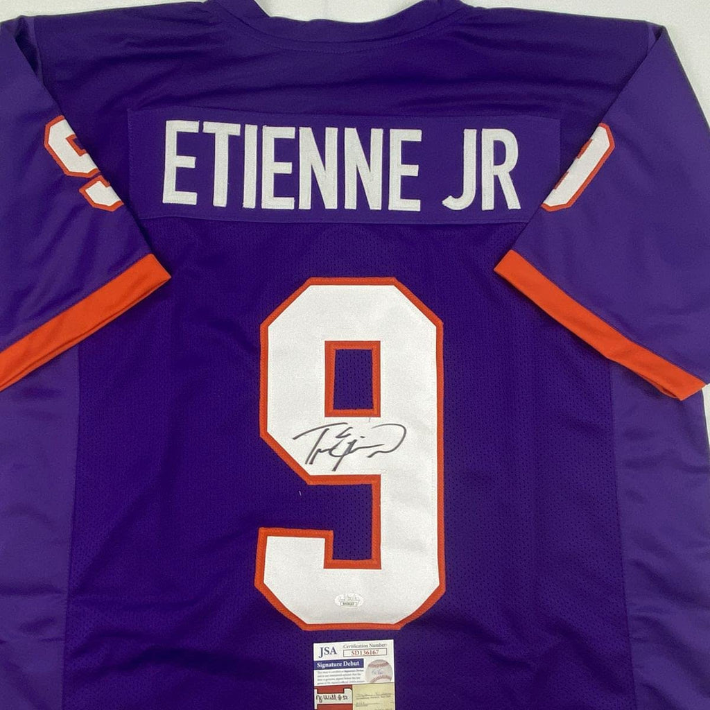 autographed-signed-travis-etienne-jr-clemson-purple-college-football-jersey-jsa-coa