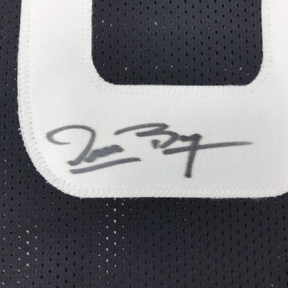 autographed-signed-muggsy-bogues-space-jam-monstars-black-basketball-jersey-psa-dna-coa