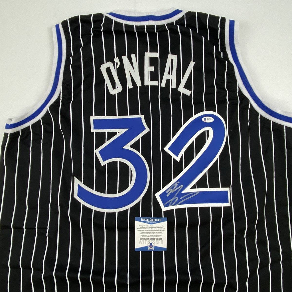 autographed-signed-shaquille-shaq-oneal-orlando-black-pinstripe-basketball-jersey-beckett-bas-coa