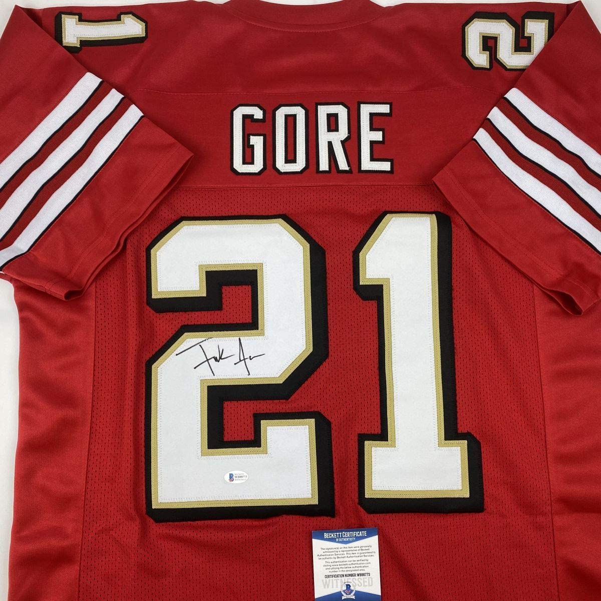 autographed-signed-frank-gore-san-francisco-red-alternate-football-jersey-beckett-bas-coa