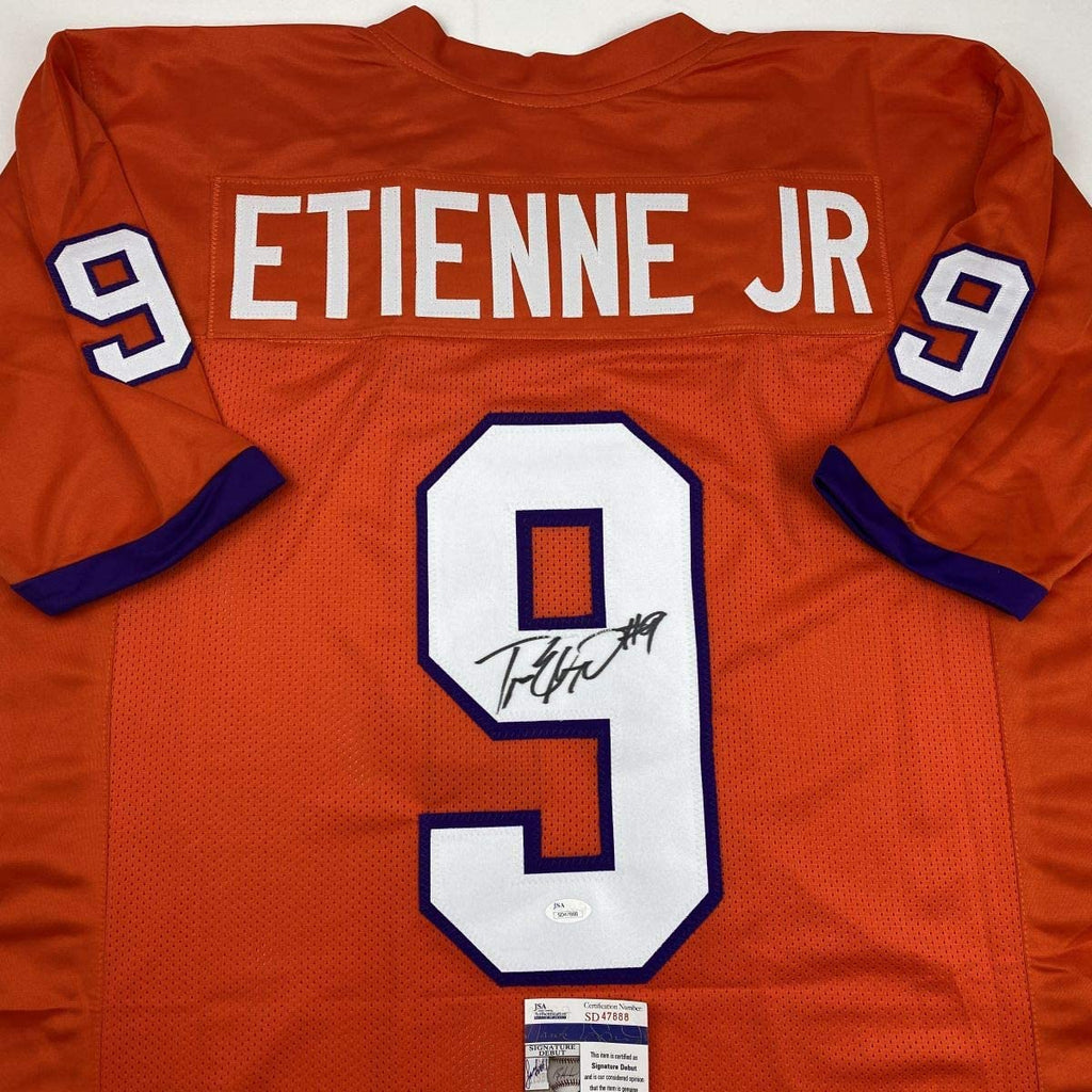 autographed-signed-travis-etienne-jr-clemson-orange-college-football-jersey-jsa-coa