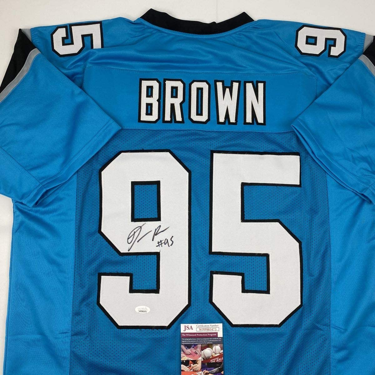 autographed-signed-derrick-brown-carolina-blue-football-jersey-jsa-coa