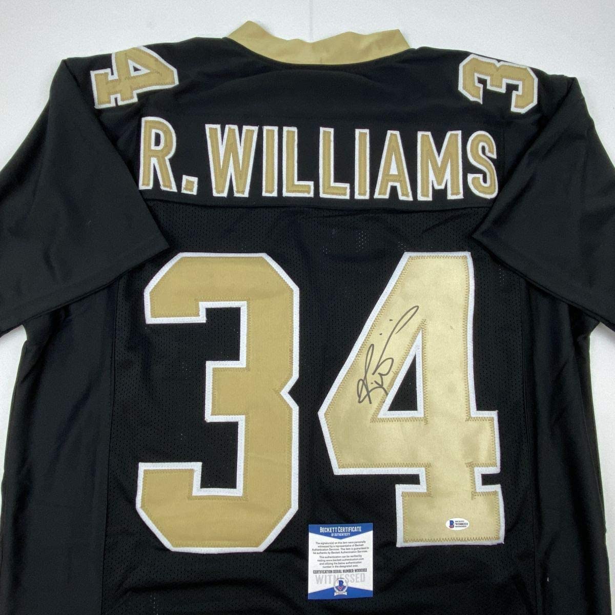 autographed-signed-ricky-williams-new-orleans-black-football-jersey-beckett-bas-coa