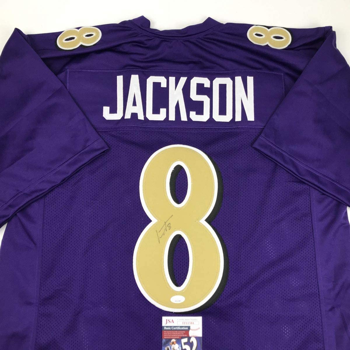 autographed-signed-lamar-jackson-baltimore-color-rush-football-jersey-jsa-coa