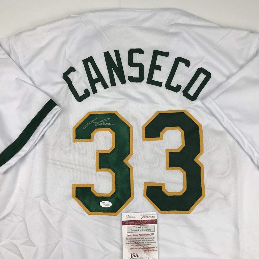 autographed-signed-jose-canseco-oakland-white-baseball-jersey-jsa-coa