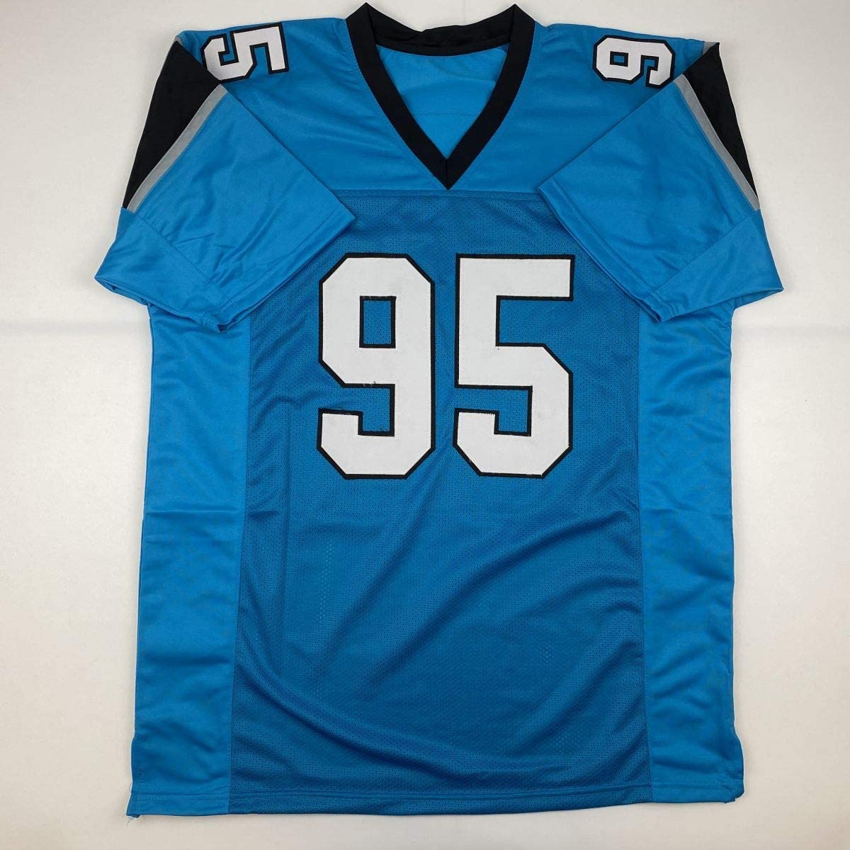 autographed-signed-derrick-brown-carolina-blue-football-jersey-jsa-coa