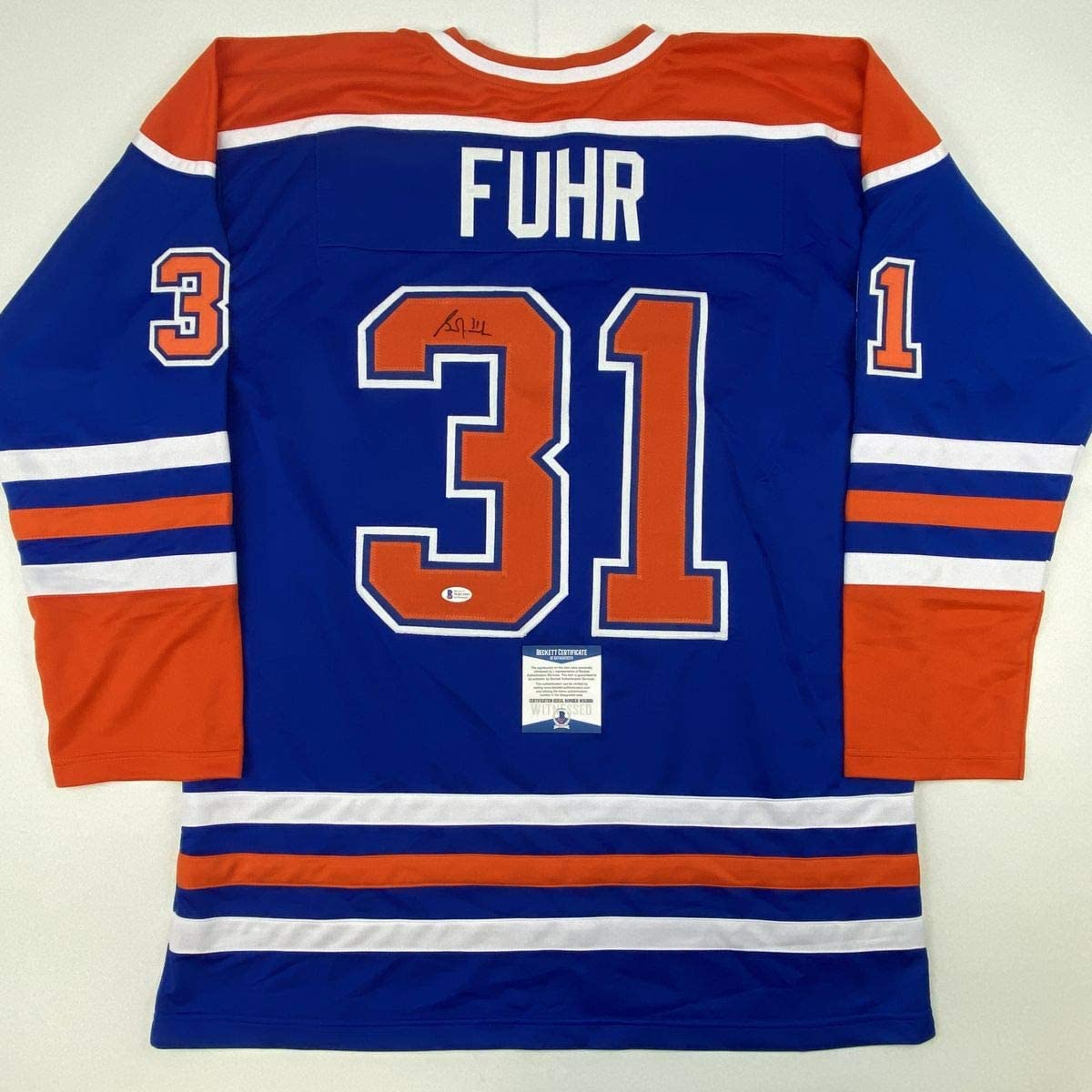 autographed-signed-grant-fuhr-edmonton-blue-hockey-jersey-beckett-bas-coa