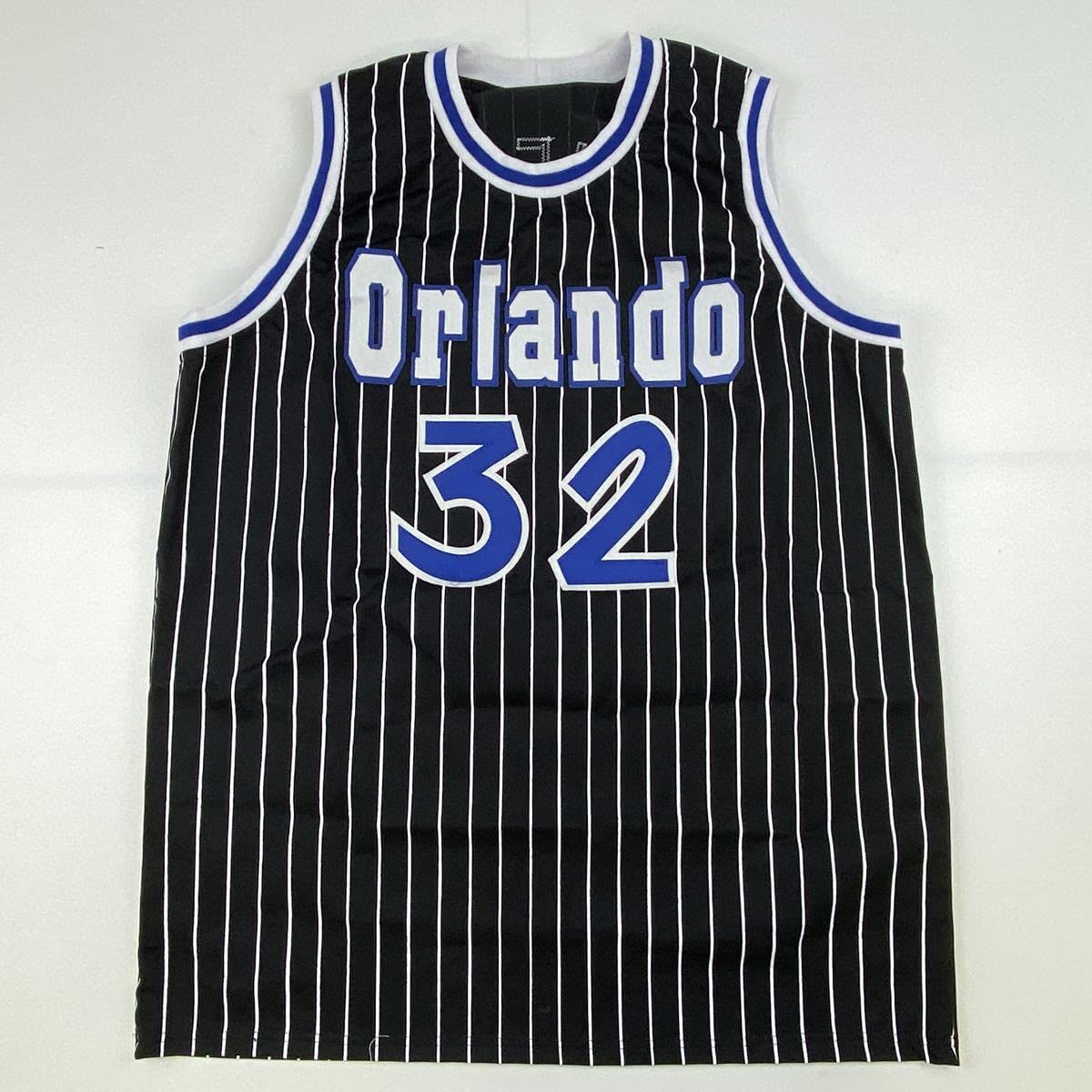autographed-signed-shaquille-shaq-oneal-orlando-black-pinstripe-basketball-jersey-beckett-bas-coa