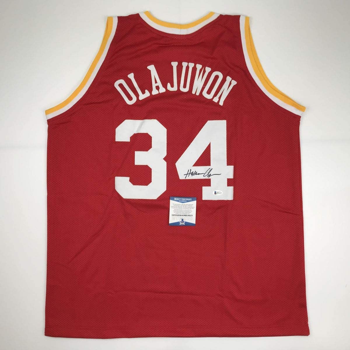 autographed-signed-hakeem-olajuwon-houston-red-basketball-jersey-beckett-bas-coa