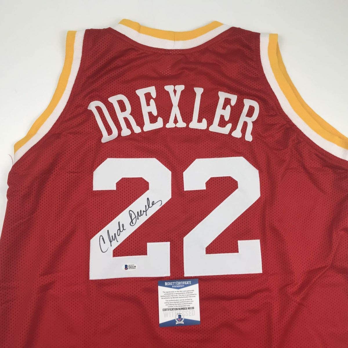 autographed-signed-clyde-drexler-houston-red-basketball-jersey-beckett-bas-coa